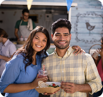 Alamo Flea Market: couple eating and enjoying at Mercadome